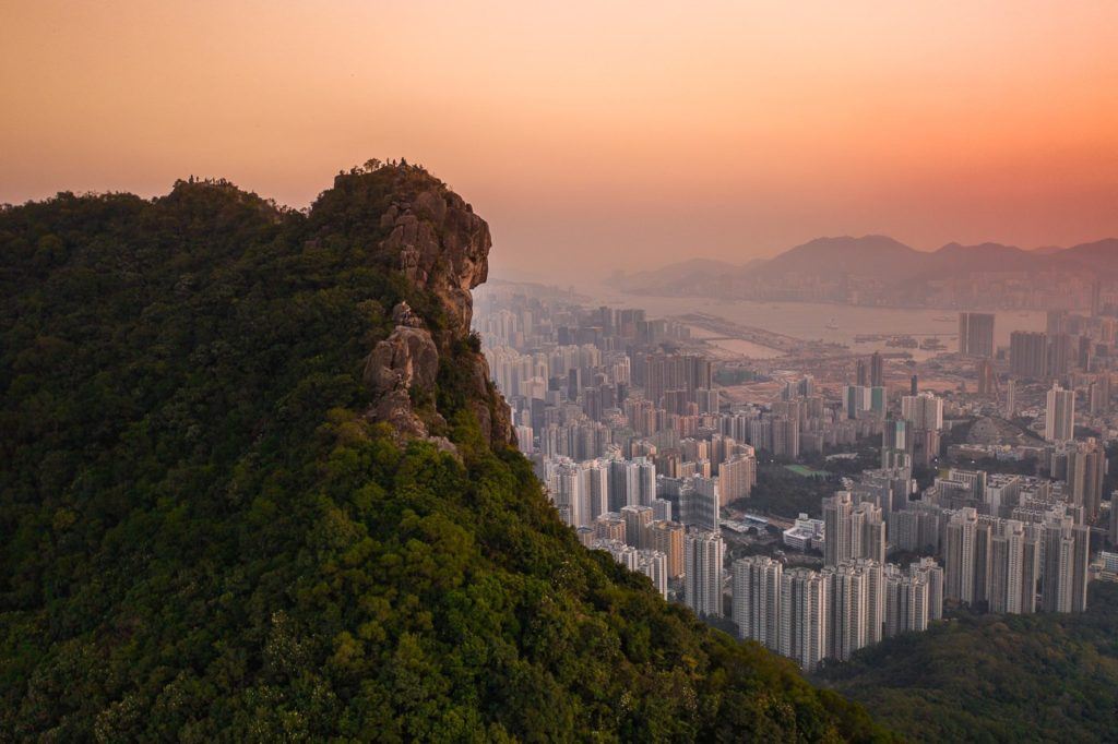 a view of a city from the top of a mountain.
